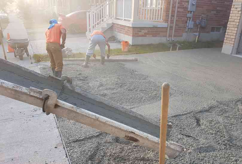 Elegant plain concrete driveway with a clean finish